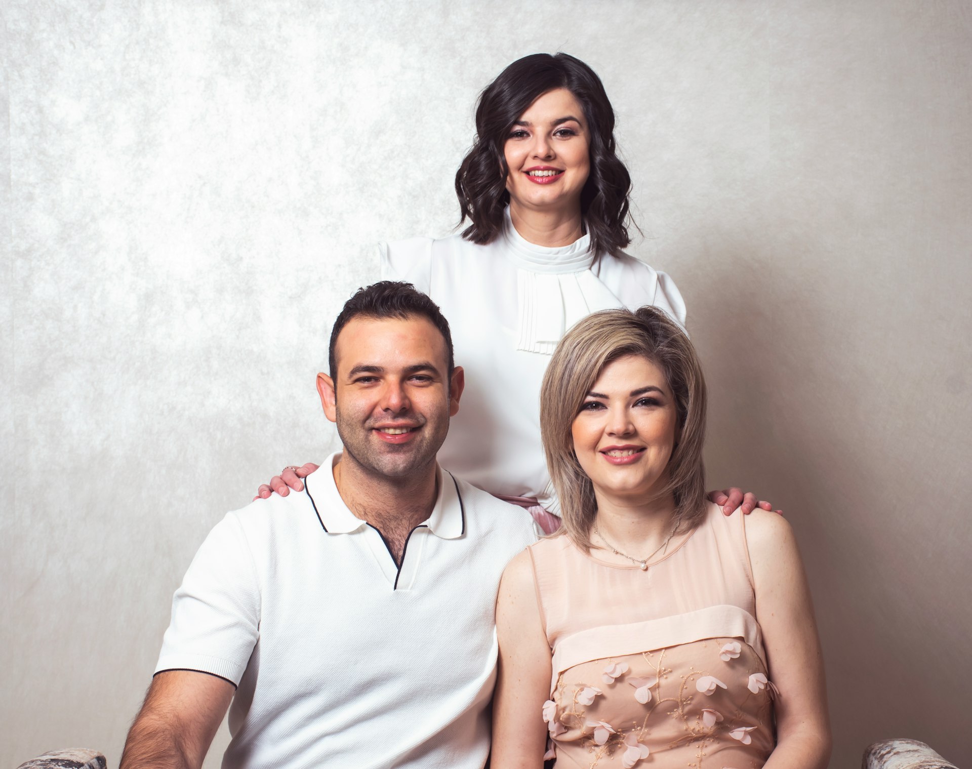 a couple of people sitting next to each other